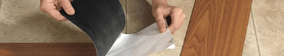 A professional installing vinyl flooring in Philadelphia, PA